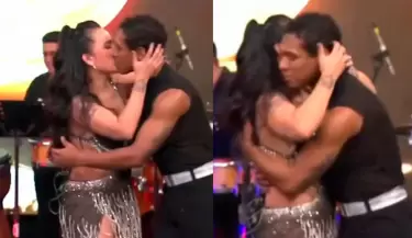 Daniela Darcourt y Waldir Felipa se dan apasionado beso durante presentacin.