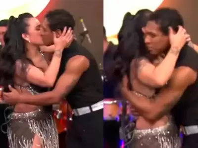 Daniela Darcourt y Waldir Felipa se dan apasionado beso durante presentacin.